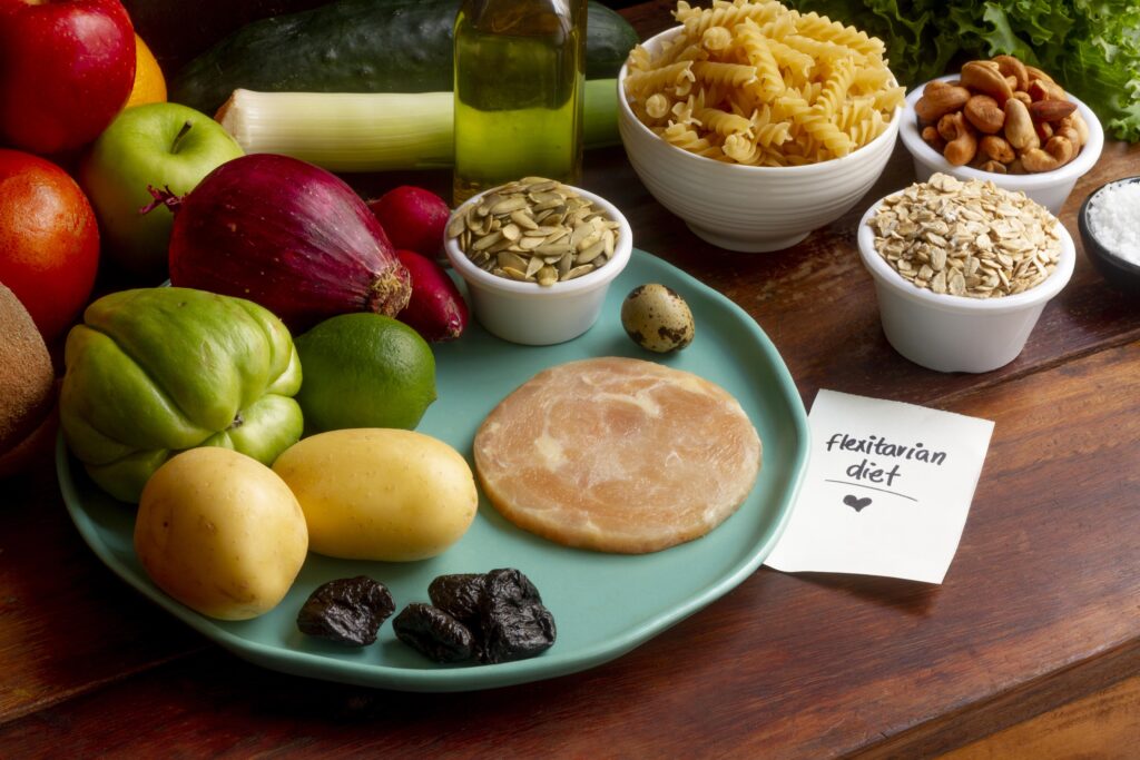 high angle flexitarian diet food assortment - „Wspieramy każdego w odkrywaniu i rozwijaniu swojego potencjału, by żyć pełnią życia”